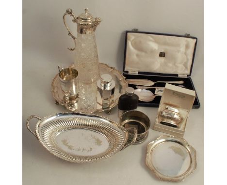 A collection of silver plated items, to include trays, basket, flatware, claret jug, lighters, snuffer and stand etc