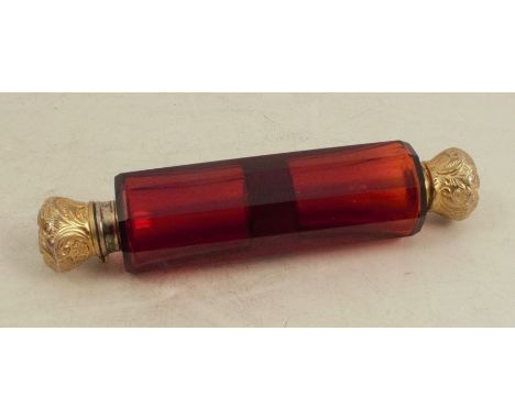 A Victorian double ended ruby glass scent bottle, with gilt caps