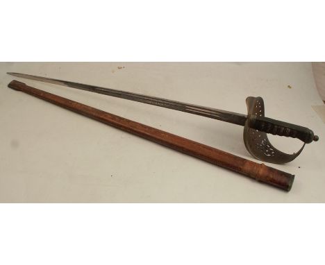 A Munks &amp; Son Sheffield Royal Engineers dress sword, with etched blade, shagreen covered handle and pierced hilt, with le