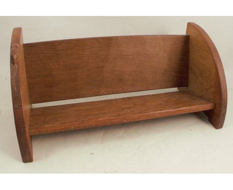 A Robert Mouseman Thompson oak book trough, width 18ins, height 8insCondition Report:  In satisfactory condition, some minor 