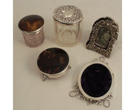 A silver and tortoiseshell ring box, of circular form, Birmingham 1924, together with a glass dressing table pot, with hallma