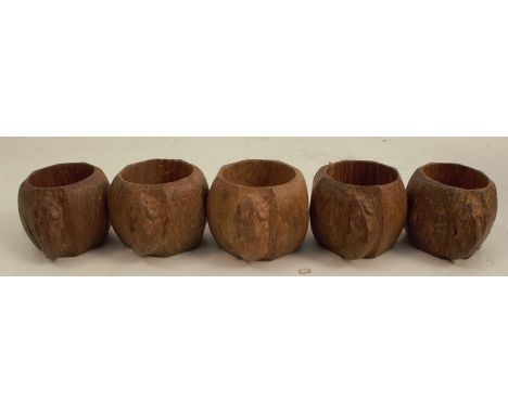 Five Robert Mouseman Thompson oak napkin rings, of octagonal form carved with mice
