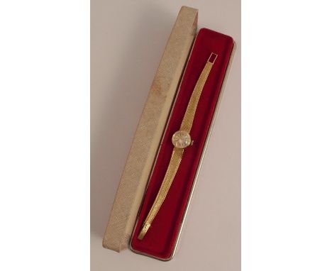 Tissot, a lady's mechanical bracelet watch, stamped '750', 21g gross, excluding the movement, original box