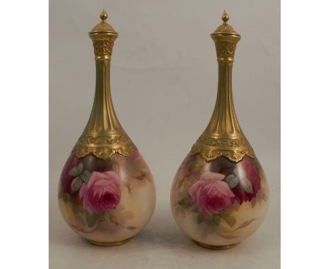 A pair of Royal Worcester covered vases, decorated with roses by Sedgley, shape number F103, height 10insCondition Report:  S
