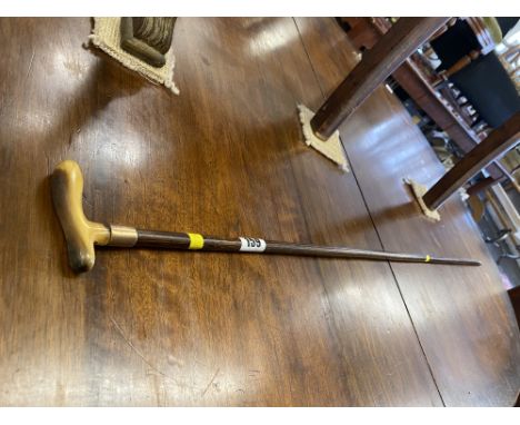 A gentleman's walking stick with 9ct gold strap/ bone handle