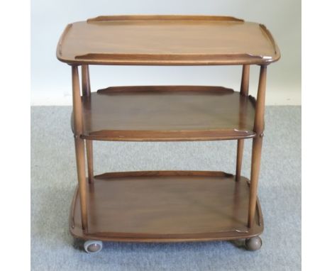 An Ercol light elm three tier drinks trolley, 71cm 