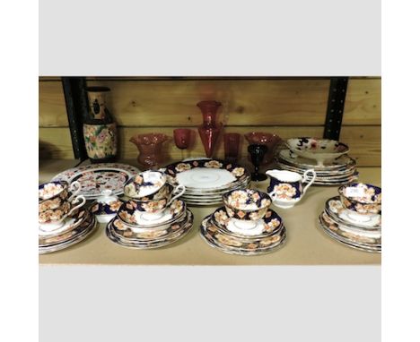 A Royal Albert Heirloom pattern part dinner service, together with a blue glass rolling pin and decorative china and glass