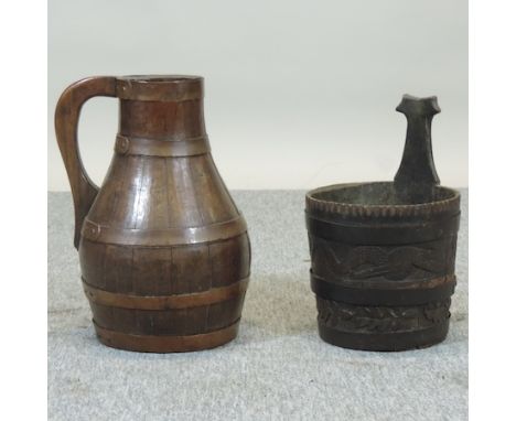 A coopered oak ewer, 38cm, together with Dutch coopered carved oak planter