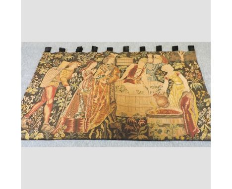 A 20th century tapestry wall hanging, depicting figures, 140 x 198cm overall 