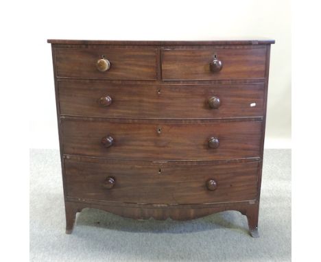 A George III mahogany bow front chest, on swept bracket feet, 109cm