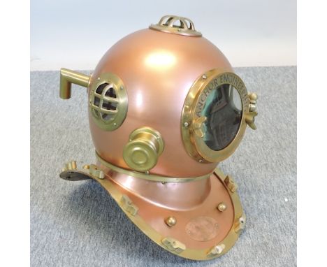 A copper diver's helmet, 45cm tall