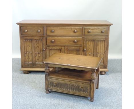 An Ercol elm sideboard, 155cm, together with a coffee table