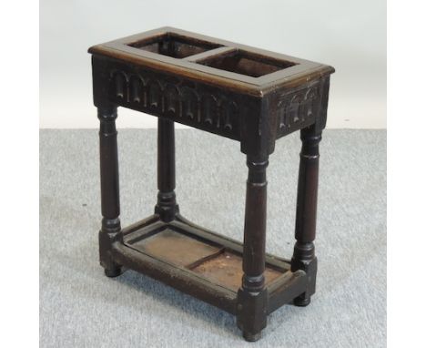 An 18th century carved oak stick stand, 48cm