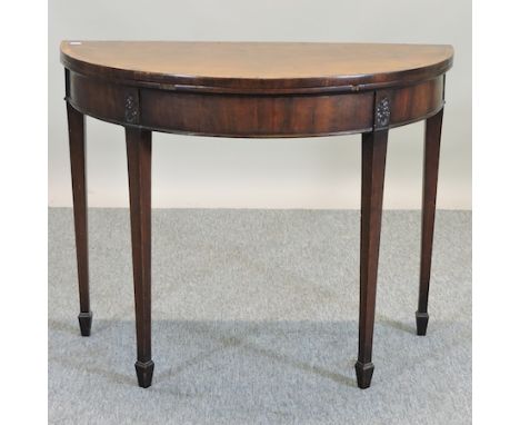 A George III mahogany half round card table, 91cm