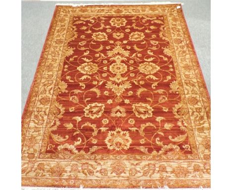 A Ziegler carpet, with all over foliate designs, on a red ground, 280 x 200cm 