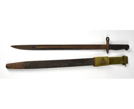 A WWI period bayonet, 1913 model to fit the Enfield rifle, with scabbard and canvas frog, blade length 43cm.