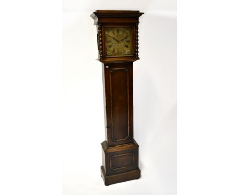 An early 20th century oak longcase eight day clock, the stepped frieze above gilded dial set with Roman numerals, 188 x 42 x 