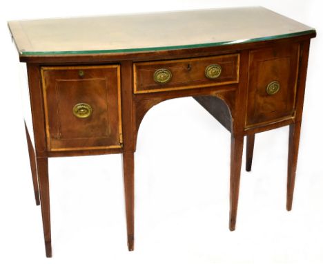 A George III mahogany crossbanded and line inlaid bow fronted sideboard, with single frieze drawer flanked by pair of deep dr