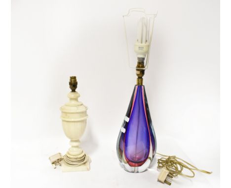 A mid-20th century cased glass table lamp in a teardrop shape, with clear pink and purple colourways, height 34cm, together w