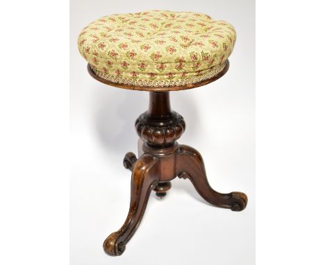 A Victorian mahogany adjustable height piano stool, with button upholstered circular seat in cream woven material with heathe