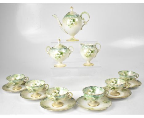 A Victorian six-piece tea service decorated in the Oriental style, ivory and green ground with cherry blossom decoration, sma