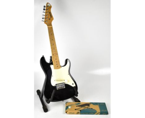ROCKWOOD BY HOHNER; an LX-30 six-string electric guitar, length 80cm, a Rockstand guitar stand and a boxed Stagg guitar foot 