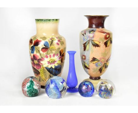 Two 19th century overpainted glass vases, both painted with Autumn flowers and leaves, height of tallest 28cm, a small blue a