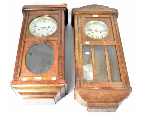 A 1930s oak cased wall clock, the silvered dial set with Arabic numerals, movement striking on a coil, within a plain case wi