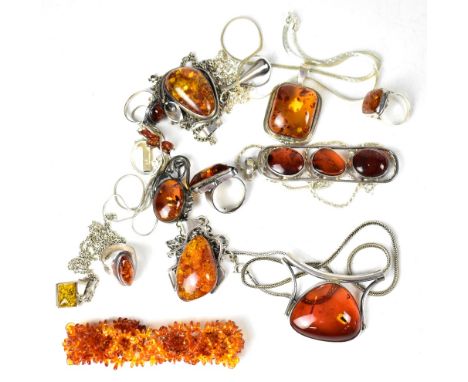 Various items of mixed modern silver Baltic-style amber items to include rings, brooch, necklaces, cross on chain, etc.