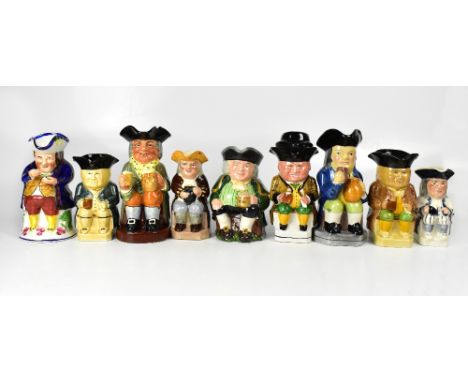 A collection of twenty character and Toby jugs to include a Royal Doulton 'Happy John', a Carltonware Toby jug modelled in a 