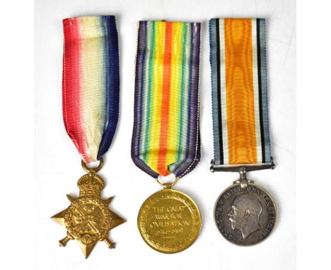 A WWI group of three medals and ribbons to include 1914 Star awarded to PTE R. Broomhall of the First Royal Welsh Fusiliers n