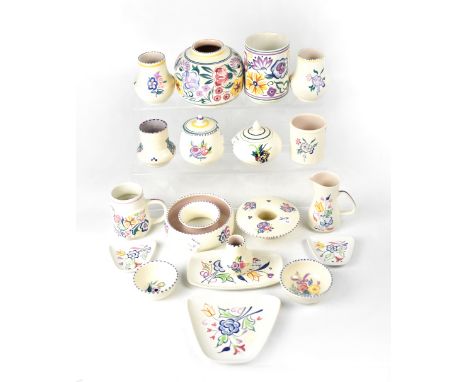 POOLE; a group of nineteen ceramics in the early 20th century traditional floral patterns, to include a squat baluster vase, 