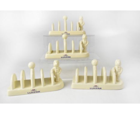 Four retro Lurpak ivory ceramic toast racks (4).