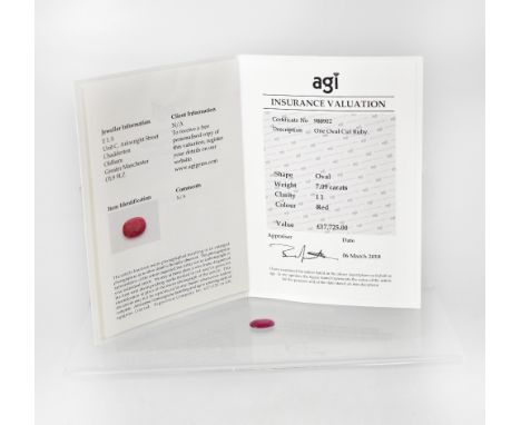 A loose 7.09 carat oval ruby with AGI insurance valuation.  CONDITION REPORT Please note loose gems are subject to VAT