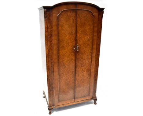 An Edwardian mahogany double bed frame, stepped top rail and inset oval inlaid panel, curved bottom rail, both to castors, he