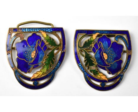 A late 19th century Art Nouveau enamelled gilt metal buckle, each side with centred blue enamelled flower, with green enamell