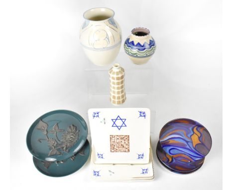 POOLE; a group of eleven ceramics to include three 'The Matzo' plates, length 18.5cm, a pair of decorative teal blue ground p