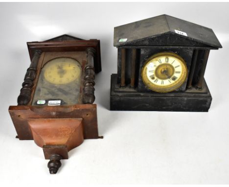 A Victorian slate mantel clock in architectural style case, the ivorine dial set with Roman numerals, eight day movement stri