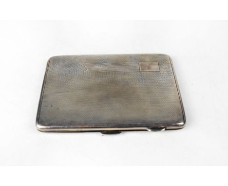 A George V hallmarked silver cigarette case of rectangular form with engine turned and Art Deco linear decoration, blank cart