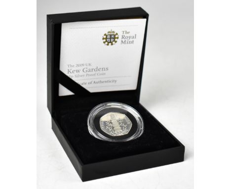 THE ROYAL MINT; the 2009 UK Kew Gardens 50p silver proof coin, product issue limit 7500, encapsulated, with certificate of au