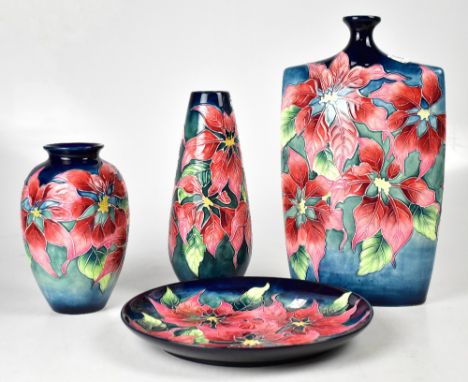 A group of four Old Tupton ware decorative ceramics, a large tube lined purse vase with berry and leaf decoration on a cobalt