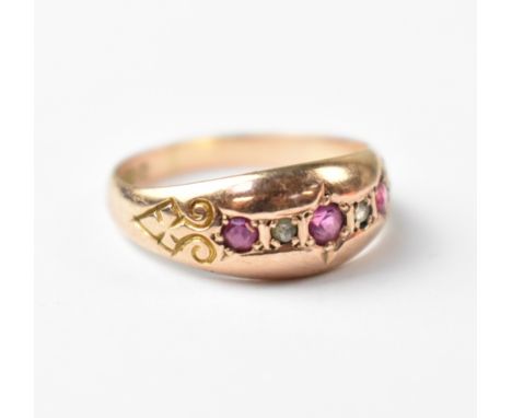 A 9ct rose gold diamond and ruby ring, three small rubies separated by two tiny diamond chips, size S, approx 2.8g.