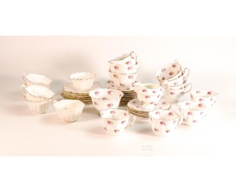 A collection of Wileman &amp; Co pattern 7447 to include 4 coffee cups and saucers, Gainsborough cream jug and sugar bowl, 6 