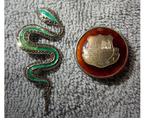 STERLING SILVER ENAMEL AND MARCASITE COBRA LAPEL BROOCH AND A STERLING SILVER MOUNTED TENBY COAT OF ARMS BROOCH