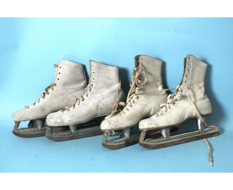 Two pairs of lady's white leather ice skates, eight various rackets, a lacrosse stick, tennis balls, etc.