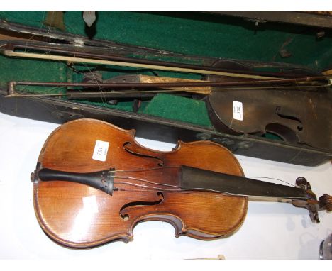 A late-19th/early-20th century full-size violin with 'Guarnerius' paper label, another label 'Repaired Matthew Lewis', with r