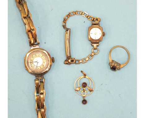 A lady's 9ct-gold-cased wrist watch on gold sprung bracelet, another gold-cased wrist watch on plated bracelet, an Edwardian 