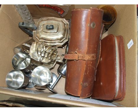 A 20th century EPNS travelling cocktail shaker with three glass flasks, juice squeezer, three stirrup cups and strainer, stam