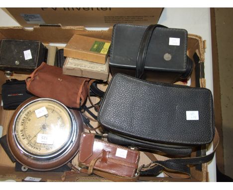 A chrome-plated aneroid barometer, various cameras, a Specteo ciné projector in box and other items.