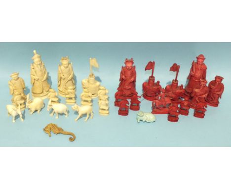 A collection of Chinese Indian stained chess pieces from two incomplete sets.